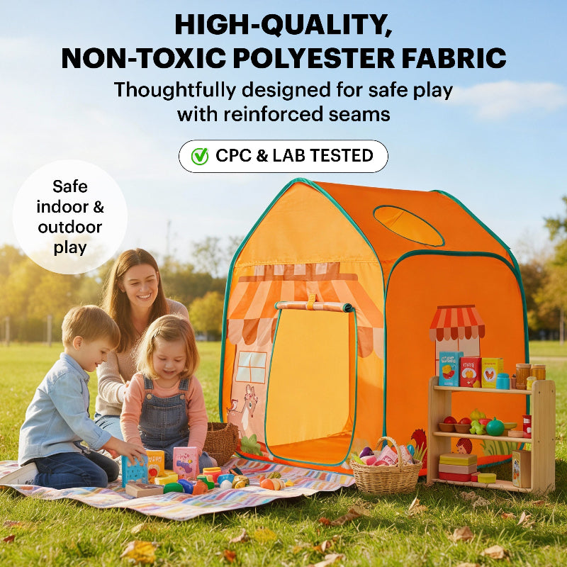 A mother and two children playing with a toy market stall and grocery items on a picnic blanket next to an orange play tent in a park; includes a "CPC & Lab Tested" badge.